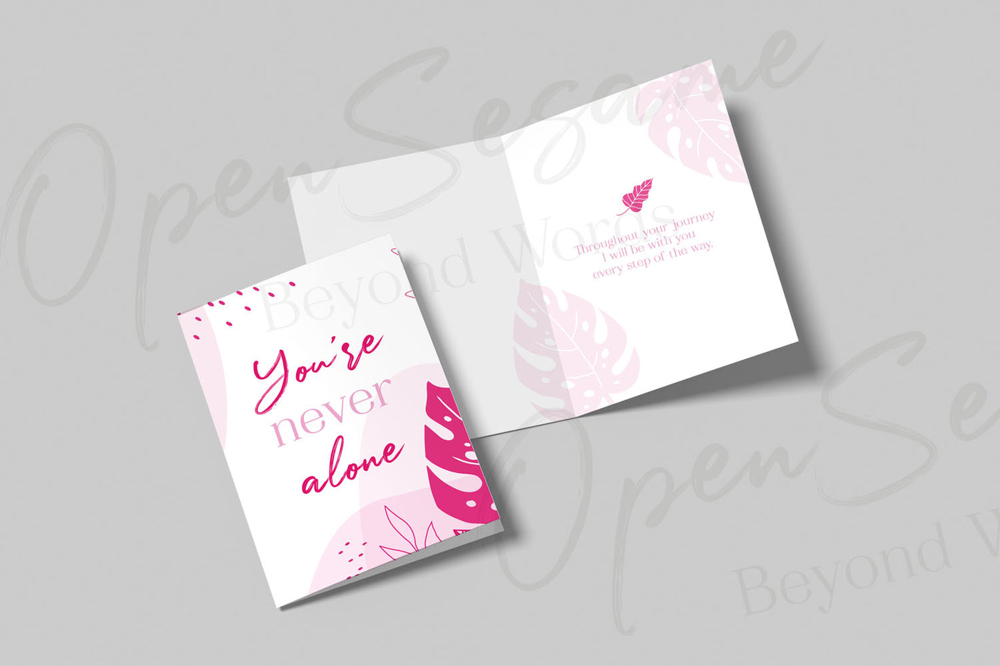 The front of the card, which is in support of those with cancer, reads "You’re never alone Throughout your journey" by Open Sesame Cards.