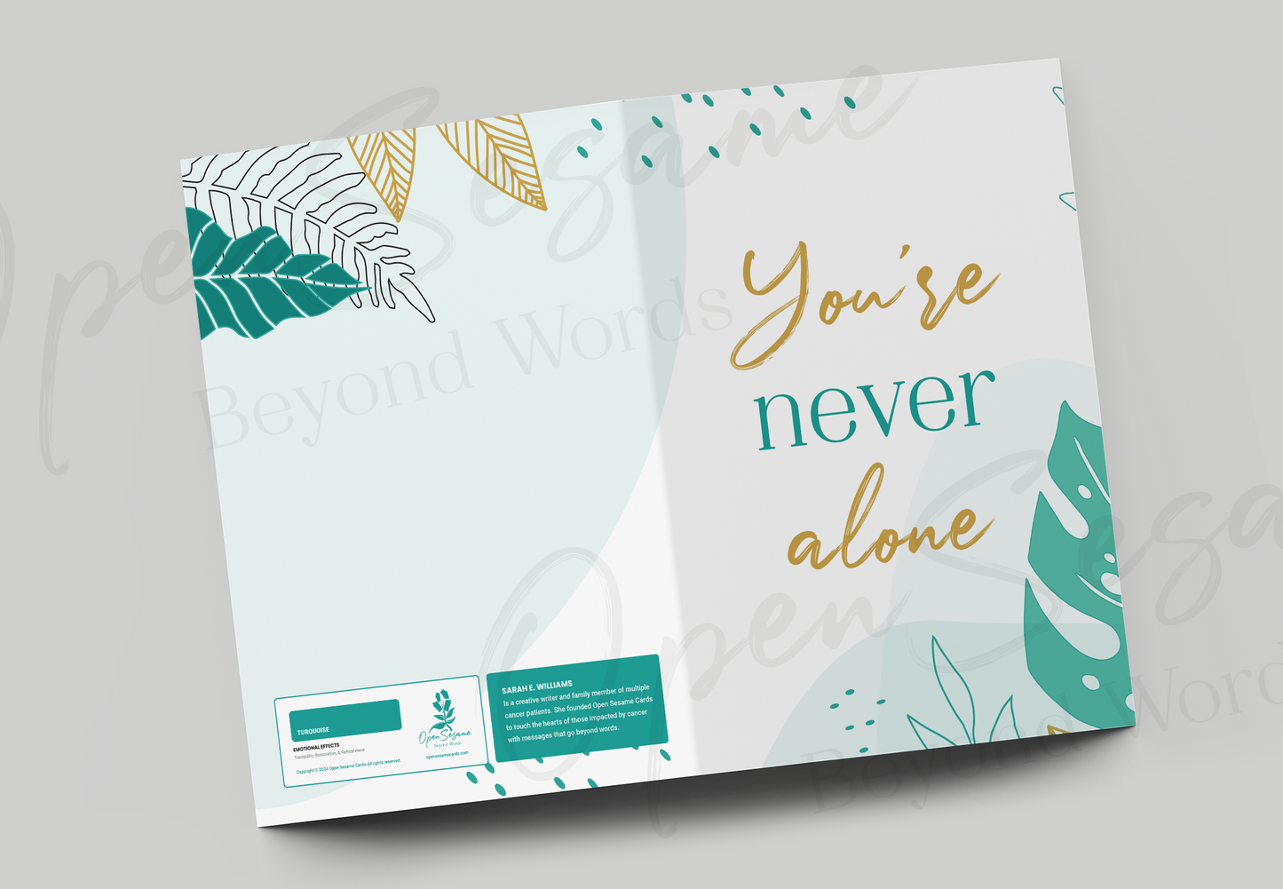 Front of card in support of those with cancer that reads ‘You're Never Alone’.