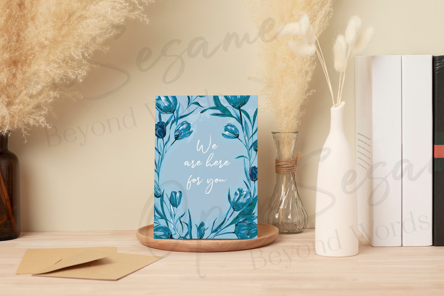 Front of card in support of those with cancer that reads ‘We Are Here For You’.