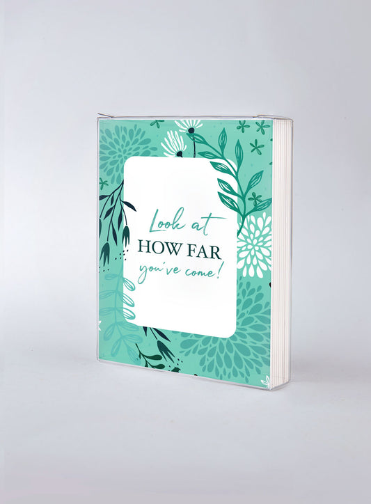 Front of card in support of those with cancer that reads ‘Look at how far you’ve come!’.
